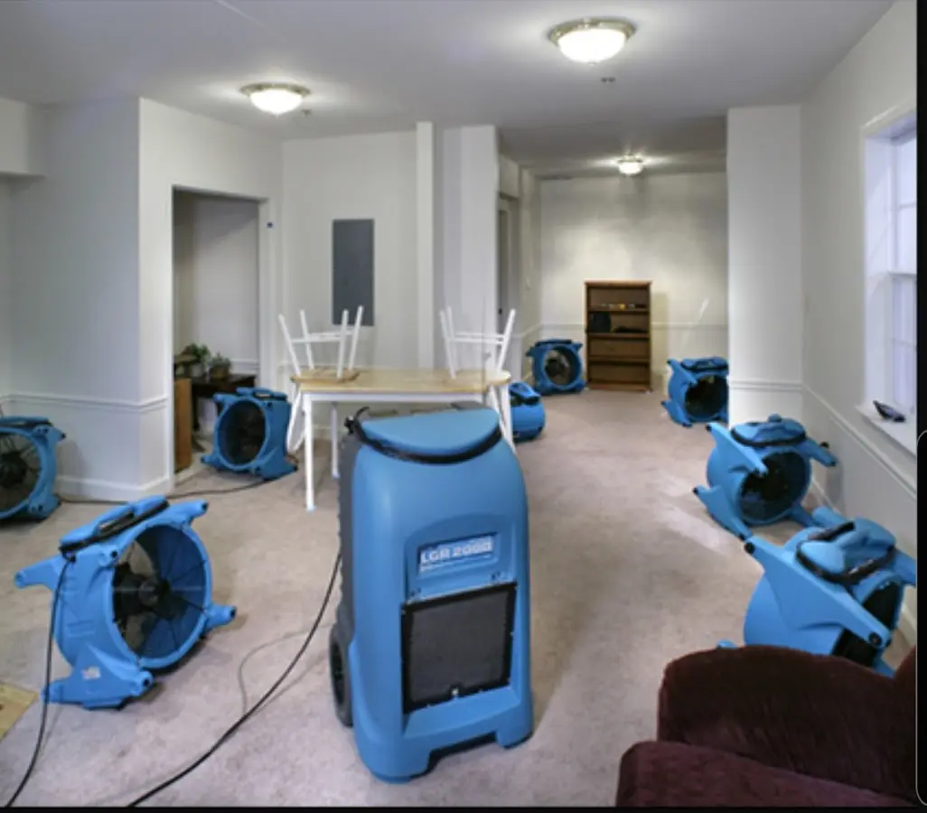 Air movers and dehumidifier setup for Water Damage Restoration in Whitpain